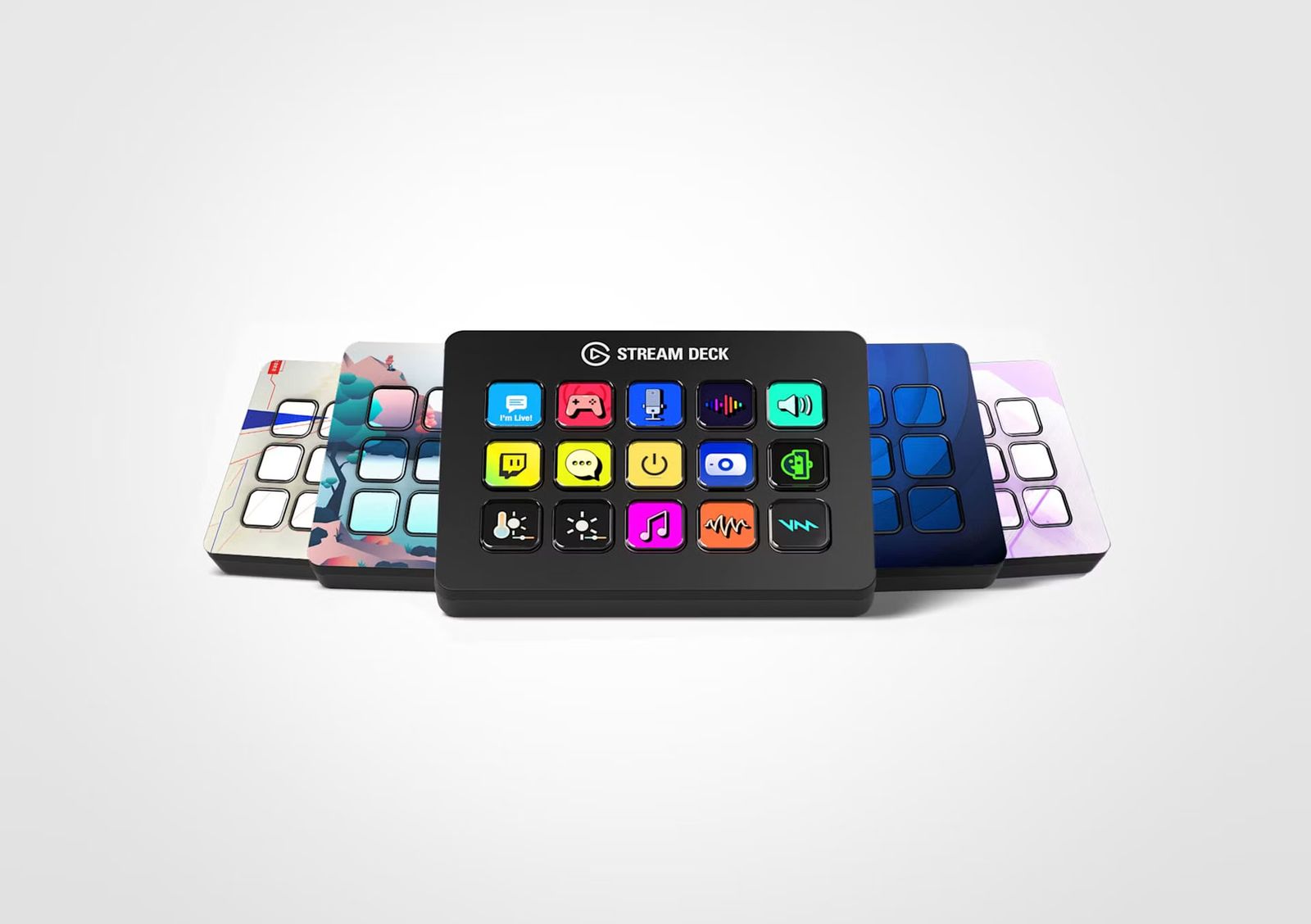 A Stream Deck with colourful key icons in front of decks wearing different faceplates
